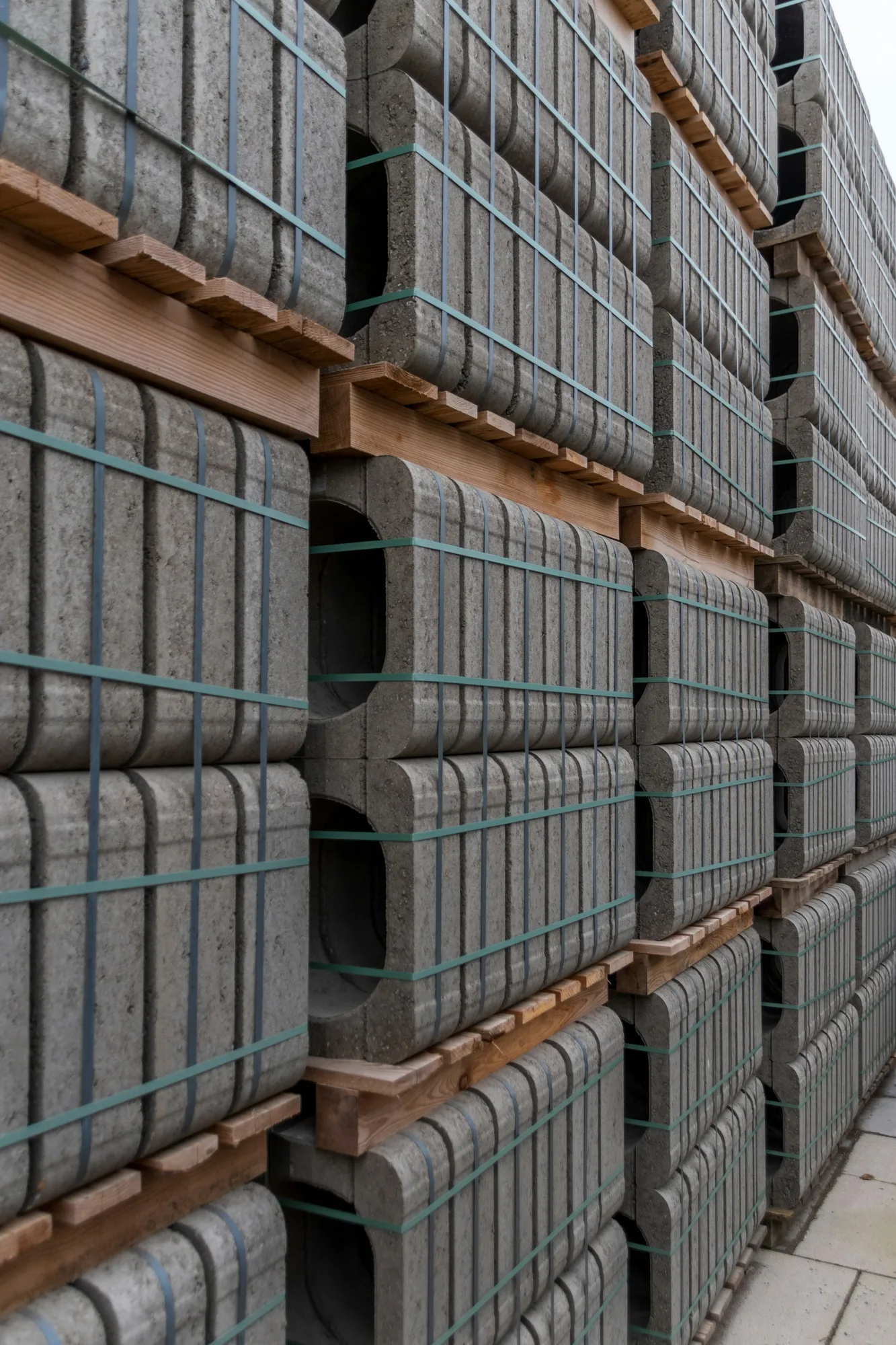 Stacks of cast concrete units on pallets